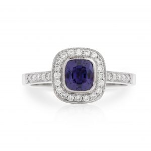 purple sapphire cushion as rubover cluster ring