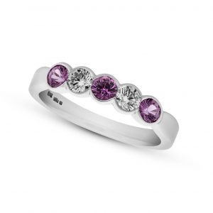 pink sapphire and diamond platinum eternity ring
